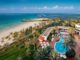 Ajman Hotel overlooks the clear blue waters of the Arabian Gulf