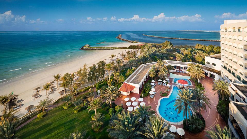 Ajman Hotel overlooks the clear blue waters of the Arabian Gulf